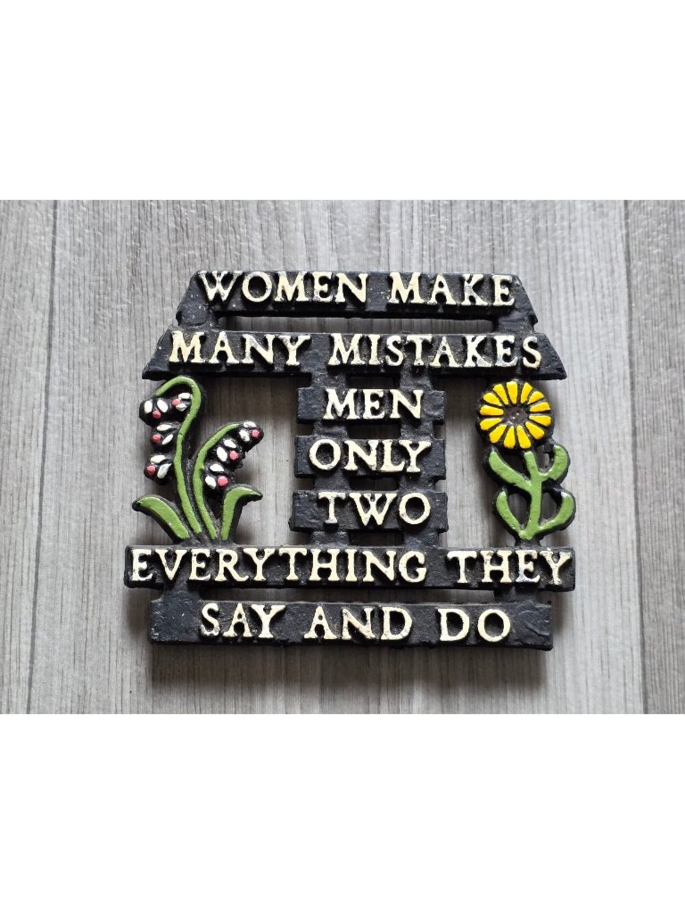 Women Make Many Mistakes Cast Iron Hanging Plaque Trivet With Floral Design
